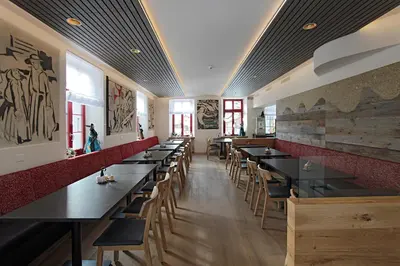 Ein Restaurant oder anderes Speiselokal in der Unterkunft Hotel Blattnerhof