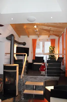 Ein Sitzbereich in der Unterkunft Hotel Alpha
