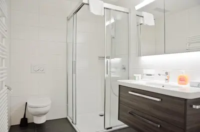 Ein Badezimmer in der Unterkunft Apartment Gänseblüemli - GRIWA RENT AG