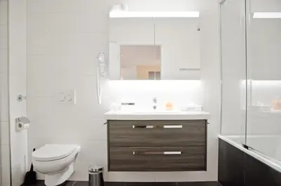 Ein Badezimmer in der Unterkunft Apartment Gänseblüemli - GRIWA RENT AG