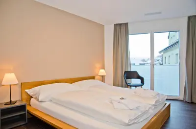 Ein Bett oder Betten in einem Zimmer der Unterkunft Apartment Edelwyss - GRIWA RENT AG