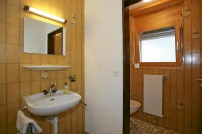 Ein Badezimmer in der Unterkunft Haus Rothorn, Swiss Alps