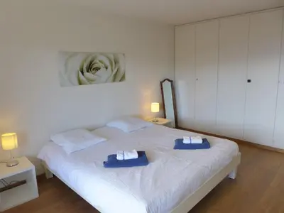 Ein Bett oder Betten in einem Zimmer der Unterkunft Apartment Monte Cristo 6 by Interhome