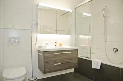 Ein Badezimmer in der Unterkunft Apartment Krokus - GRIWA RENT AG