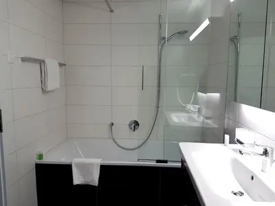 Ein Badezimmer in der Unterkunft Apartment Arnika - GRIWA RENT AG