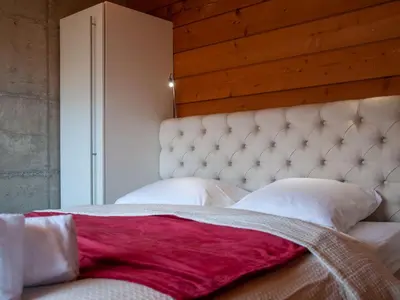 Ein Bett oder Betten in einem Zimmer der Unterkunft Chalet Papillon by Interhome