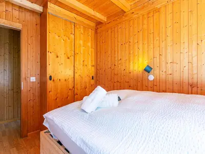 Ein Bett oder Betten in einem Zimmer der Unterkunft Chalet Chalet Mayens by Interhome