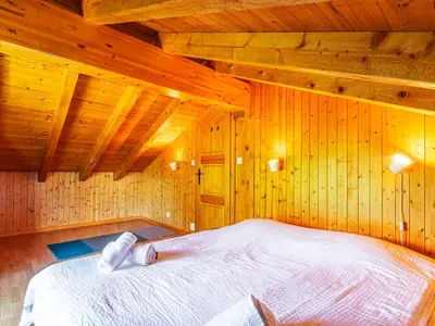 Ein Bett oder Betten in einem Zimmer der Unterkunft Chalet Chalet Mayens by Interhome