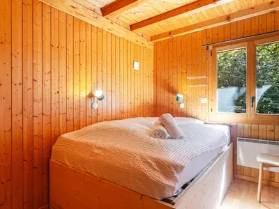 Ein Bett oder Betten in einem Zimmer der Unterkunft Chalet Chalet Mayens by Interhome