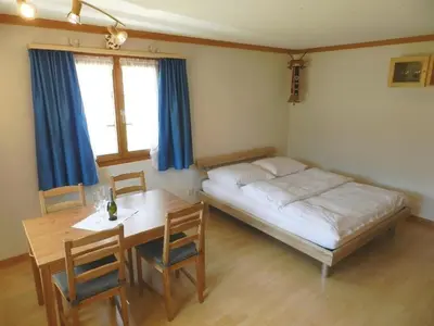Ein Bett oder Betten in einem Zimmer der Unterkunft Apartment Studio Rinderbergblick by Interhome