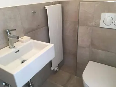 Ein Badezimmer in der Unterkunft Apartment Turmalin 2- Stock by Interhome