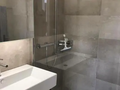 Ein Badezimmer in der Unterkunft Apartment Turmalin 2- Stock by Interhome