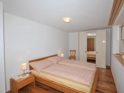 Ein Bett oder Betten in einem Zimmer der Unterkunft Apartment Blauherd by Interhome