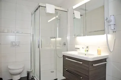 Ein Badezimmer in der Unterkunft Apartment Anemone - GRIWA RENT AG
