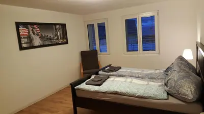 Ein Sitzbereich in der Unterkunft Attika Wohnung Spiez