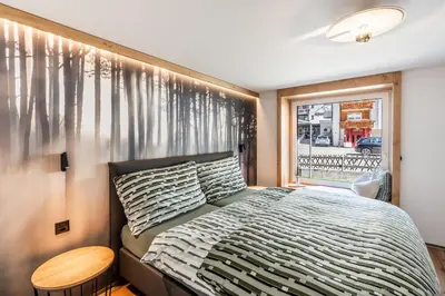 Ein Bett oder Betten in einem Zimmer der Unterkunft Dalias Ferienparadies Apartment EDELWEISS 6P