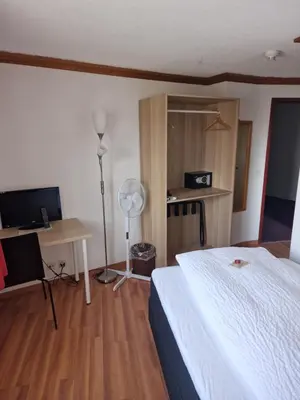 Ein Bett oder Betten in einem Zimmer der Unterkunft Hotel Alpha Thun