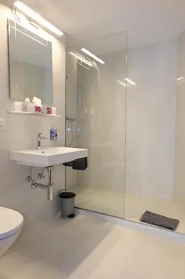 Ein Badezimmer in der Unterkunft Artist Apartments & Hotel Garni