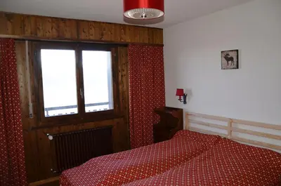 Ein Bett oder Betten in einem Zimmer der Unterkunft Immeuble La Maya