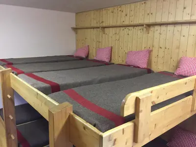 Ein Bett oder Betten in einem Zimmer der Unterkunft Restaurant Fleschboden