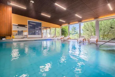 Der Swimmingpool an oder in der Nähe von Hotel Lindenhof by Crossworld AG