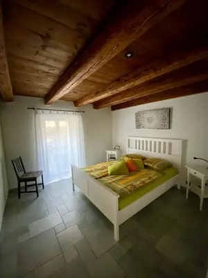 Ein Bett oder Betten in einem Zimmer der Unterkunft Cà dal Gascia