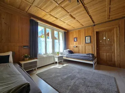 Ein Bett oder Betten in einem Zimmer der Unterkunft Mountain Holiday