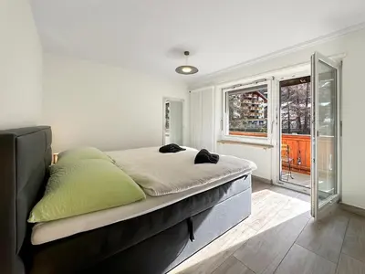 Ein Bett oder Betten in einem Zimmer der Unterkunft Eagle apartment with splendid and direct view of the Matterhorn