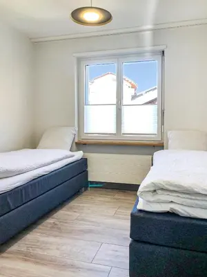 Ein Bett oder Betten in einem Zimmer der Unterkunft Eagle apartment with splendid and direct view of the Matterhorn