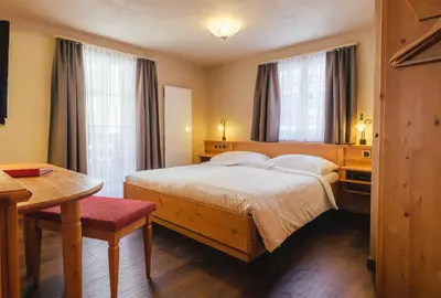 Ein Bett oder Betten in einem Zimmer der Unterkunft Guesthouse by the rex