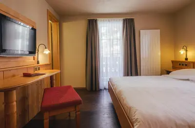 Ein Bett oder Betten in einem Zimmer der Unterkunft Guesthouse by the rex