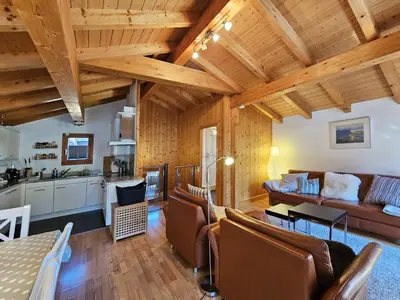 Ein Sitzbereich in der Unterkunft Chalet Flair