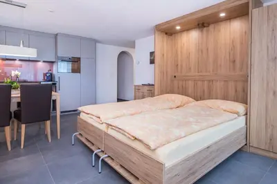 Ein Bett oder Betten in einem Zimmer der Unterkunft Ferienhaus Felicé