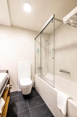 Ein Badezimmer in der Unterkunft Alpenhotel Schlüssel
