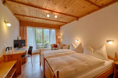 Ein Bett oder Betten in einem Zimmer der Unterkunft Neuhaus Golf- & Strandhotel