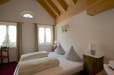 Ein Bett oder Betten in einem Zimmer der Unterkunft Gasthaus Skiklub