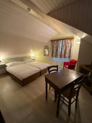 Ein Bett oder Betten in einem Zimmer der Unterkunft Hotel Antico