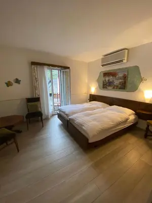 Ein Bett oder Betten in einem Zimmer der Unterkunft Hotel Antico