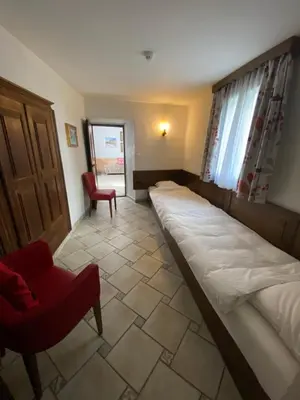 Ein Bett oder Betten in einem Zimmer der Unterkunft Hotel Antico