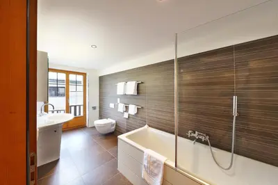 Ein Badezimmer in der Unterkunft Hotel Garni Testa Grigia