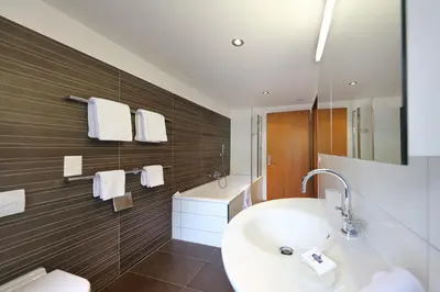 Ein Badezimmer in der Unterkunft Hotel Garni Testa Grigia