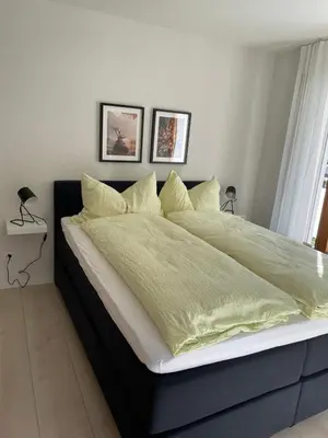 Ein Bett oder Betten in einem Zimmer der Unterkunft Apartments Soldanella