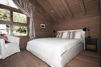 Ein Bett oder Betten in einem Zimmer der Unterkunft Chalet Kristall