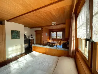 Ein Bett oder Betten in einem Zimmer der Unterkunft Alpenparadies