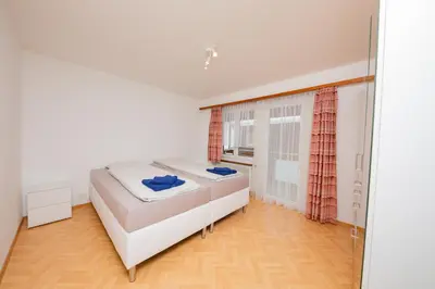 Ein Bett oder Betten in einem Zimmer der Unterkunft Haus City