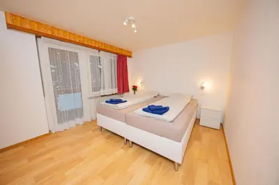 Ein Bett oder Betten in einem Zimmer der Unterkunft Haus City