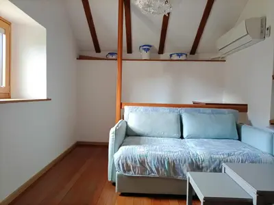 Ein Bett oder Betten in einem Zimmer der Unterkunft Rustico 
