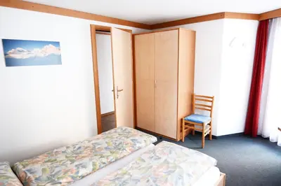 Ein Bett oder Betten in einem Zimmer der Unterkunft Bergfreude