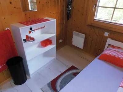 Ein Bett oder Betten in einem Zimmer der Unterkunft postman8 - Bed and Breakfast