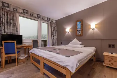 Ein Bett oder Betten in einem Zimmer der Unterkunft Hotel Ad'Eldorado